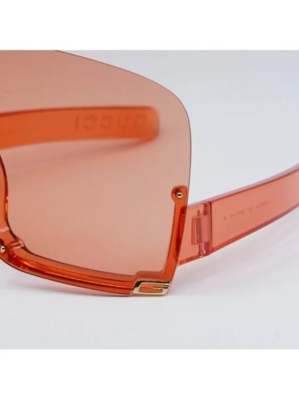 Gucci GG1631S 001 Sunglasses Transparent Red Shield Frame, Light Red Lenses